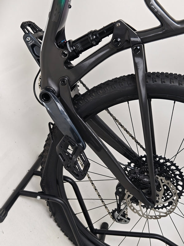 Scott Spark RC 900 Team Issue AXS Carbon bike captured at sunset for aesthetic view.