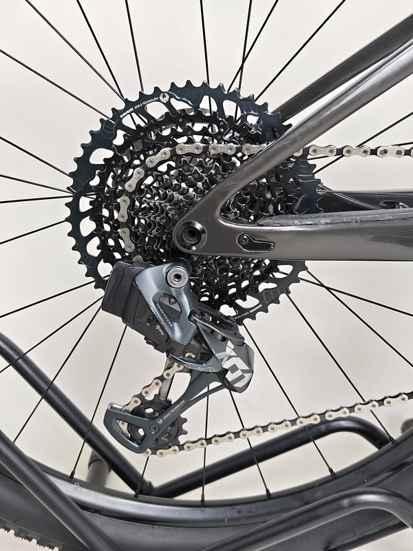 Detailed look at the front shock on the Scott Spark RC 900 Team Issue AXS Carbon bike.