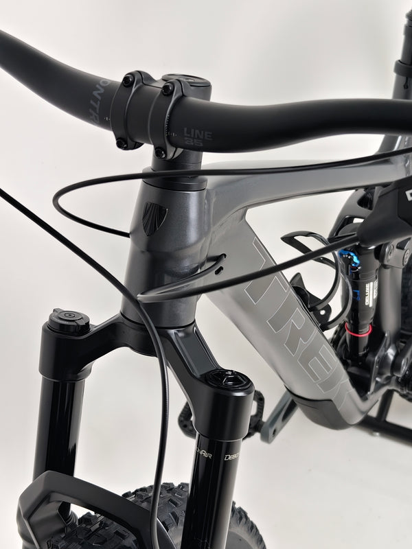 Trek Top Fuel 8 GX AXS 2024 featuring close-up on rockshox deluxe ultimate shock details.