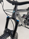 Handlebars and controls of the Specialized Status 160, featuring precise shifters and brake levers.