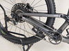 The Specialized Status 160 mountain bike poised for an ascent, ready for an adventure.