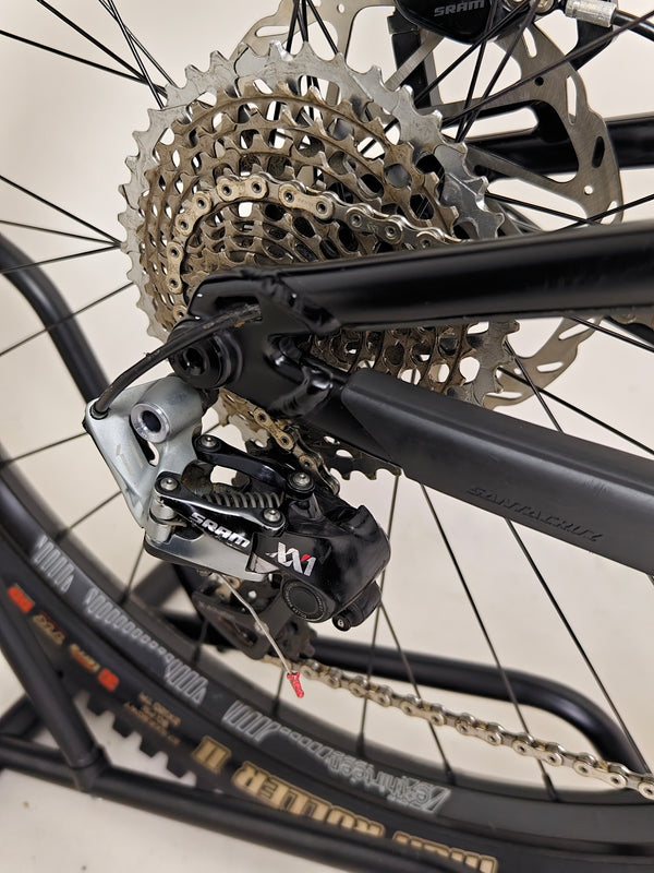 Santa Cruz Nomad Alloy R / SRAM XX1 / HOPE Hubs / E.13 / XL / Top-Spec / Very Good Condition! - Image of the bike on rugged terrain showcasing its capability.