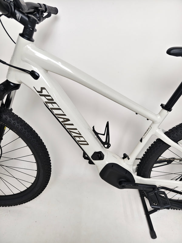 Front tire close-up of the Specialized Turbo Tero 3.0, illustrating its traction on diverse terrain.