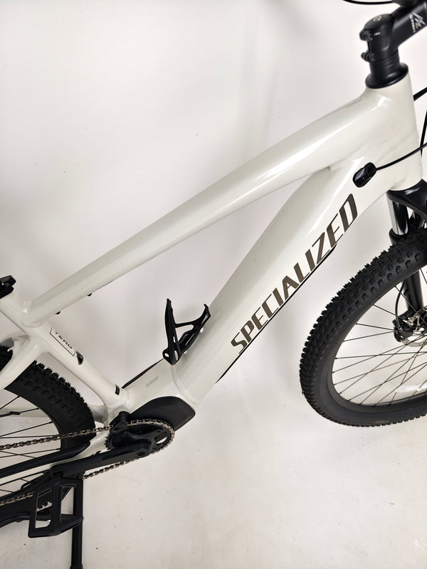 Front view panorama of the Specialized Turbo Tero 3.0 Electric MTB on an outdoor washboard trail.