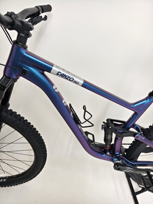 Underside view of the Voodoo CANZO Pro 2026 LARGE Dropper bike, featuring the 15mm thru-axle and showcasing its structural integrity and Like NEW appearance.