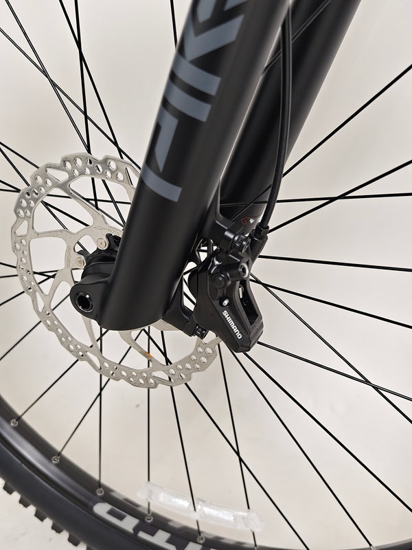 Voodoo CANZO Pro 2026 LARGE Dropper bike captured in action, demonstrating its handling and performance in Like NEW condition.