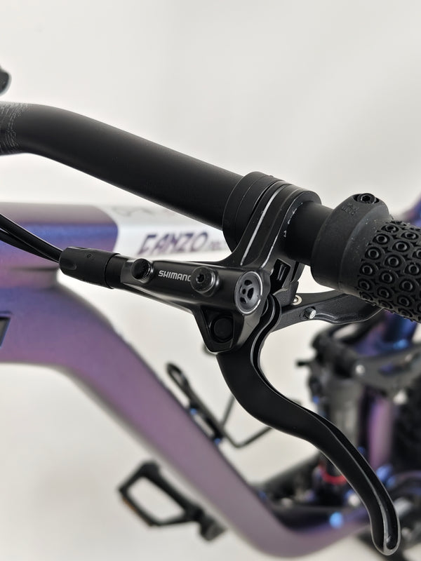 Voodoo CANZO Pro 2026 LARGE Dropper bike in a picturesque setting, highlighting its aesthetic and functional attributes in Like NEW condition.