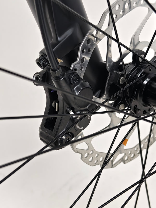 Voodoo CANZO Pro 2026 LARGE Dropper bike's components showcased on a blurred background, emphasizing its high quality and Like NEW condition.