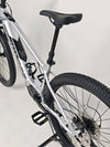 Rock Machine Blizz e60-29 electric mountain bike showing dropper seatpost and rear wheel detail.