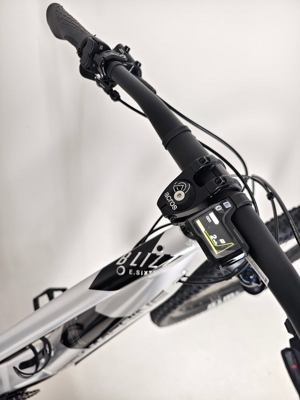 RockMachine Blizz e60-29 Electric Mountain Bike showing silver finish, LARGE size, RRP: £3,499.00, in like-new condition with just 2 miles.