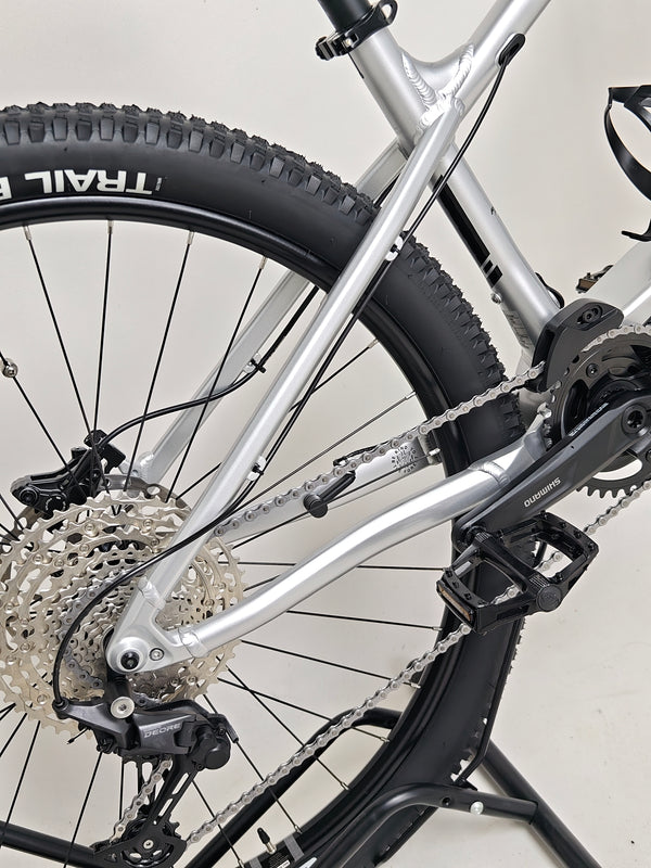 Full view of RockMachine Blizz e60-29 Electric Mountain Bike in natural light, LARGE size, RRP: £3,499.00, like new with only 2 miles.