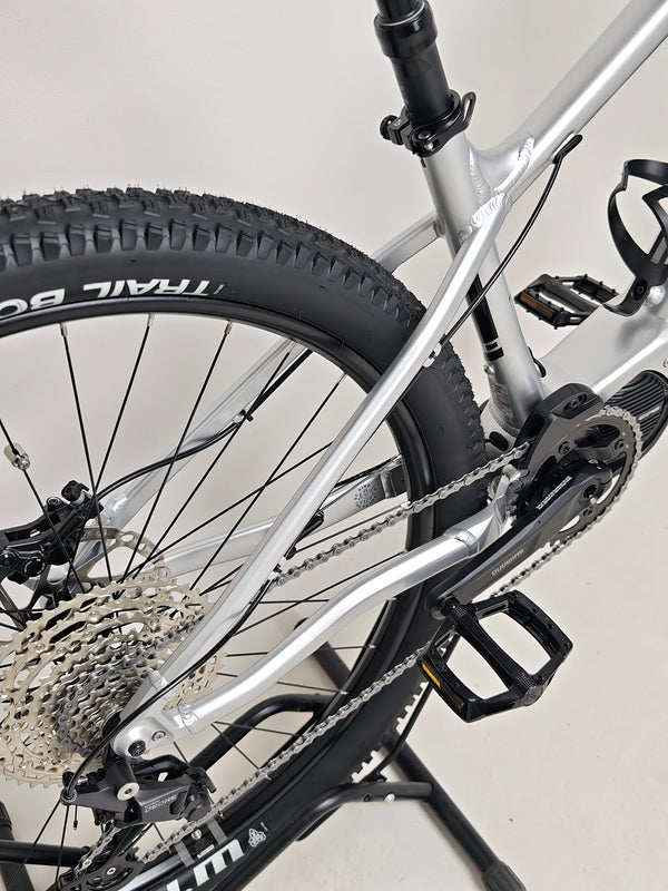 RockMachine Blizz e60-29 Electric Mountain Bike showcasing its handlebar and grips detail, LARGE size, RRP: £3,499.00, only 2 miles ridden.