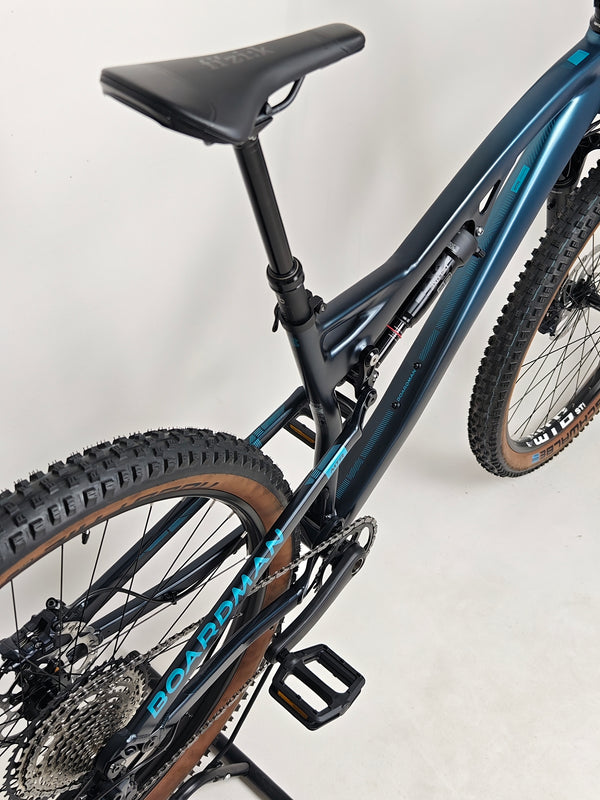 Image of the bike in a scenic outdoor setting showcasing the 2023 Boardman MTR 9.0 / LARGE / LYRIK / Very Good Condition! / Our Price: £1390.00! / RRP £2,225.00.