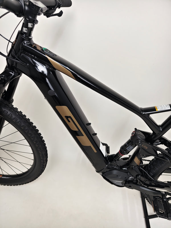 GT E Force Amp+ Full Suspension e-Bike 2024 side view showcasing the bike's excellent condition and unique features in XL, only 51 miles, for £2,250.