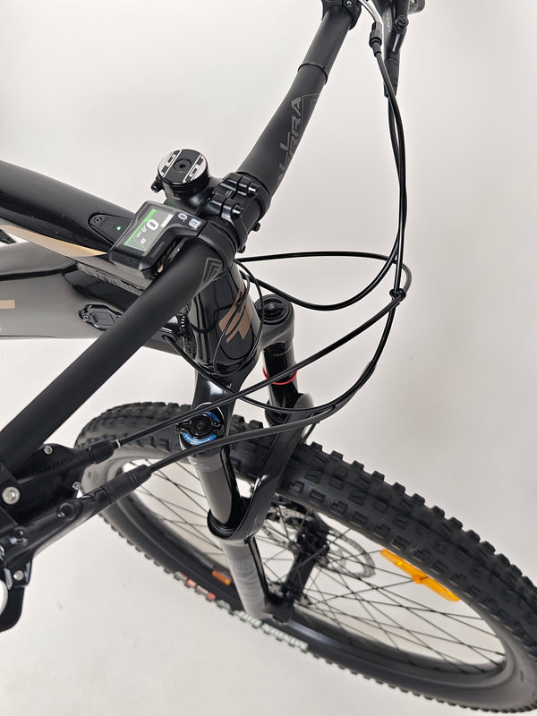 GT E Force Amp+ Full Suspension e-Bike 2024 with backdrop visualization of bike features, in excellent condition, XL size and Yari, only 51 miles, at £2,250.