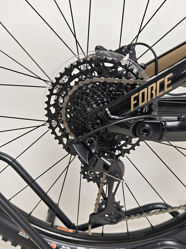 Close-up of the pedals on GT E Force Amp+ Full Suspension e-Bike 2024, featuring XL size and Yari suspension, in excellent condition, only 51 miles, at £2,250.