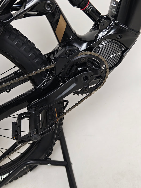 GT E Force Amp+ Full Suspension e-Bike 2024 stunning profile shot displaying its sleek design and Yari suspension in excellent condition, only 51 miles, for £2,250.