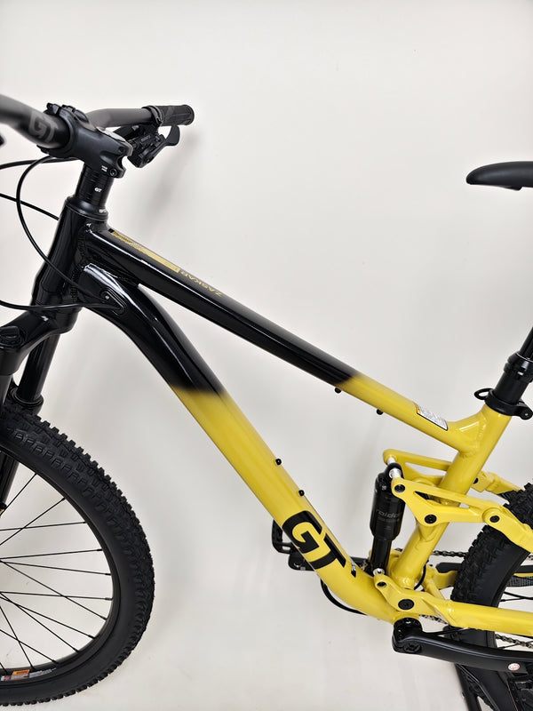 Image of the GT Zaskar FS Sport 2024 parked on a trail ready for adventure.