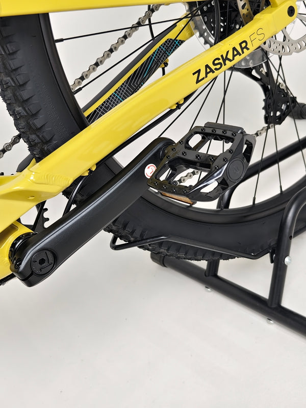 Detailed inspection of the drivetrain on GT Zaskar FS Sport 2024 emphasizing parts quality.