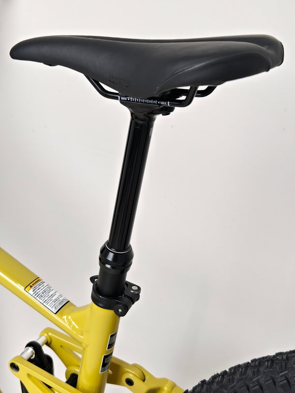 Rear view of the GT Zaskar FS Sport 2024 showing its tyres and rear derailleur setup.