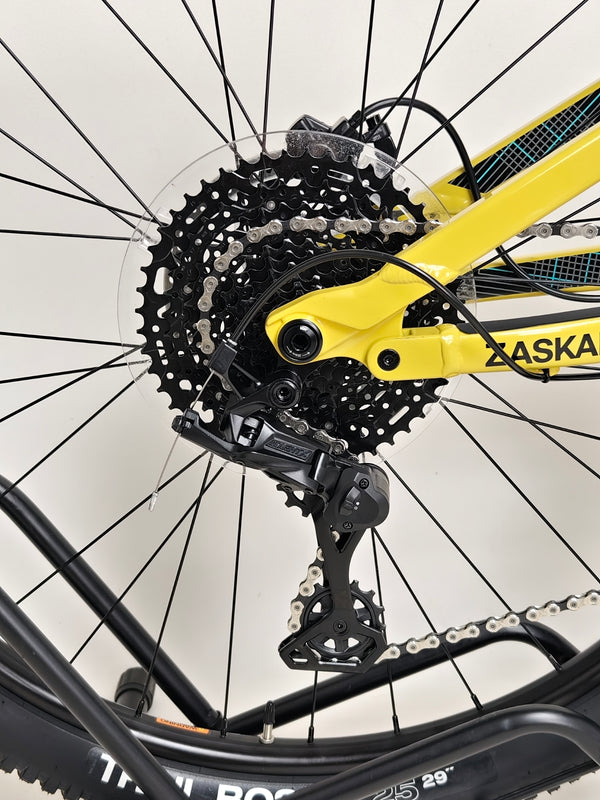 Side view of GT Zaskar FS Sport 2024 showcasing the dropper seatpost in action.