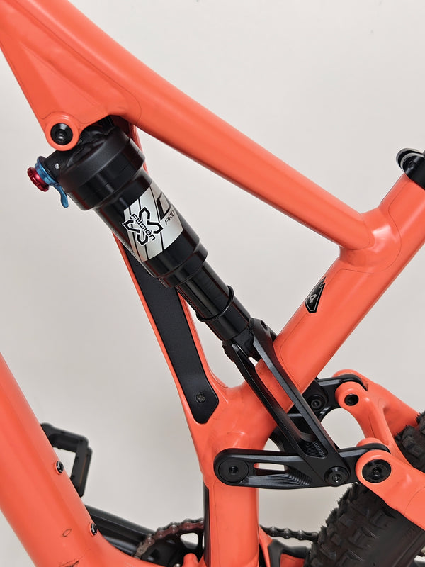 Profile shot of the rider on the 2021 Specialized Stumpjumper Alloy, emphasizing performance in very good condition priced at £1,250.00.