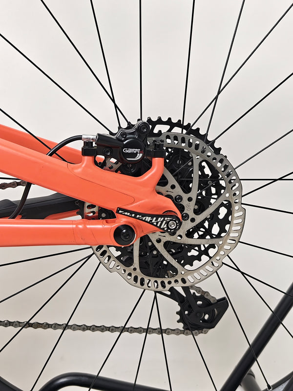 Adventure-ready view of the 2021 Specialized Stumpjumper Alloy on a trail, showcasing its capabilities in very good condition for only £1,250.00.