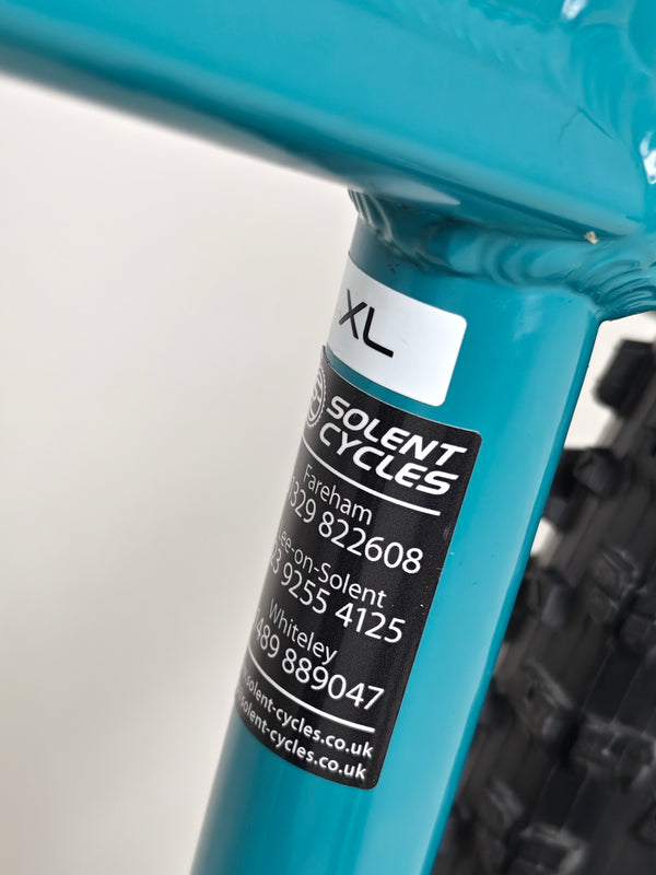 Trek ROSCOE 7 2021 with a breathtaking view of the trails, showing its rugged build, XL size, now available for £590.