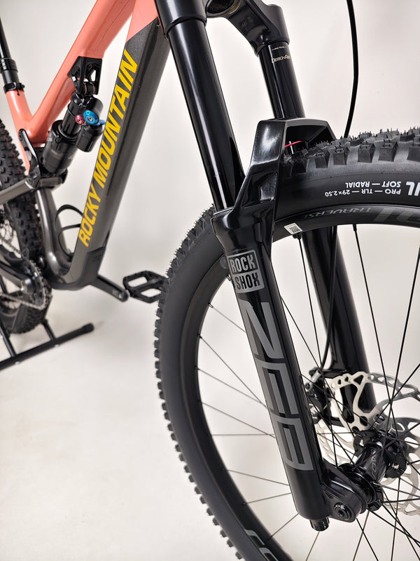 Full view of the Rocky Mountain Altitude Carbon 70 2022 in action, highlighting its excellent condition for just £2,590.00 with free UK delivery.