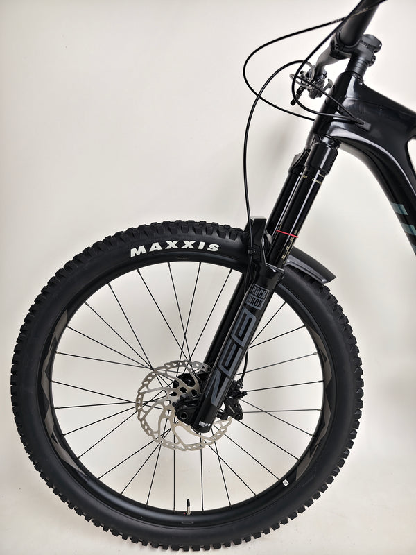 Giant Reign Advanced Pro 2 29 Carbon bike positioned against an epic mountain vista, indicating durability and performance, in Very Good Condition, LARGE size, RRP £4,499.00, currently £1,790.00!