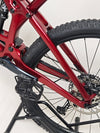 TREK Fuel EX 9.7 Gen 6 2023 FS CARBON / M-L / FOX / RRP: £4,175.00 / LIKE NEW! / Get it for £2,090.00 including FREE UK Delivery! - Side view of the bike against a rocky terrain.