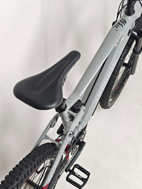 Side angle view of the Haibike AllTrail 5 27.5 2022 Full Suspension e-Bike with a focus on its features. Only £1,870.00 at eMado!