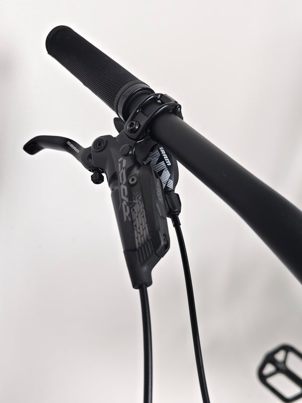 Wide shot of Specialized Stumpjumper EVO Comp Alloy 29 Medium S3 against a scenic backdrop.