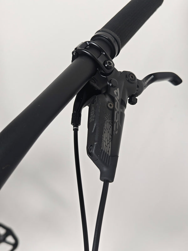 Detailed photograph showing the cable routing on the Specialized Stumpjumper EVO Comp Alloy 29 Medium S3.