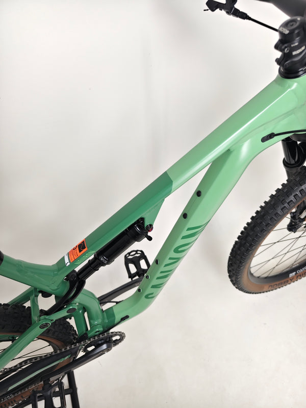 A close side view of the 2023 Canyon Neuron 7 Full Suspension Bike showing overall design and styling in Large size and Very Good Condition.