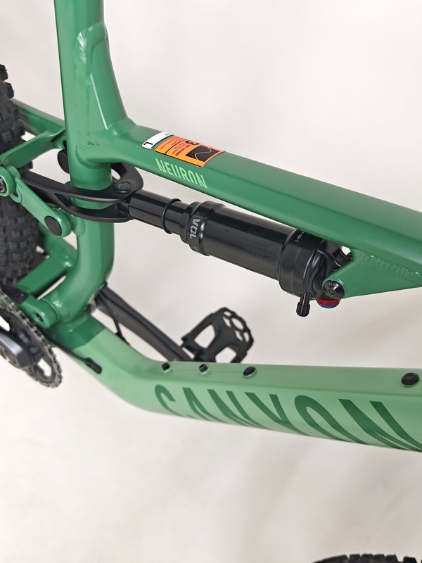 Frame alignment shot of the 2023 Canyon Neuron 7 Full Suspension Bike, emphasizing its rugged build, Large size, in Very Good Condition.