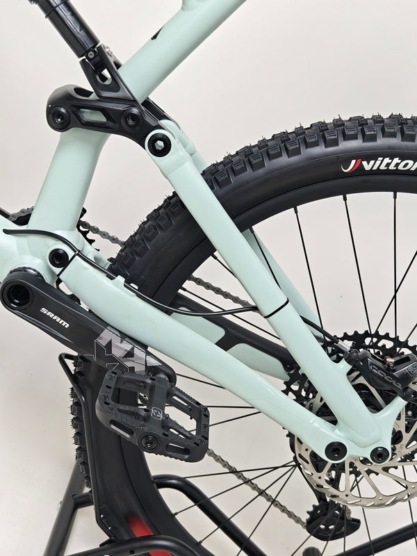 Image focusing on the iconic design of Specialized Status 160 2023 Large S4 bike in excellent condition, with an attractive price of £1,750 (RRP £2,900).