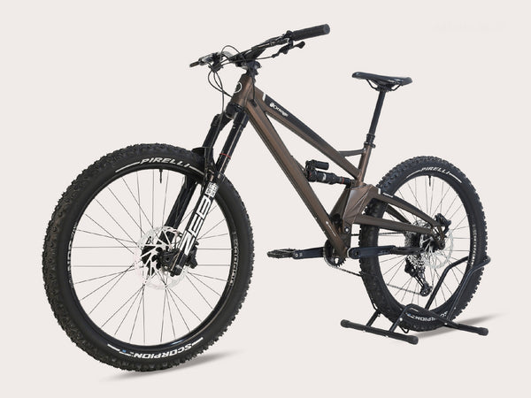 Side view of the Orange ALPINE 6 Full Suspension Mountain Bike showcasing the ZEB Forks.