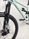 View of Specialized Status 160 2023 Large S4 bike showing its upgraded wheelset and excellent used condition, on sale at £1,750 (RRP £2,900) for trail enthusiasts.