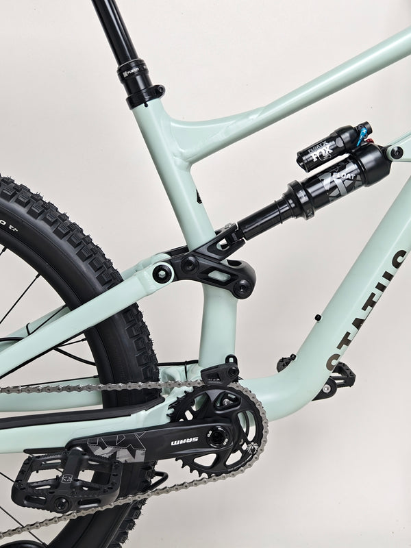 Dynamic shot of the Specialized Status 160 2023 Large S4 in action on a trail, with a focus on its excellent used condition, priced at £1,750 (RRP £2,900).