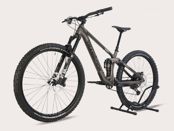 Side angle of the Transition Smuggler NX 2024 in medium, featuring the alloy frame and suspension components.